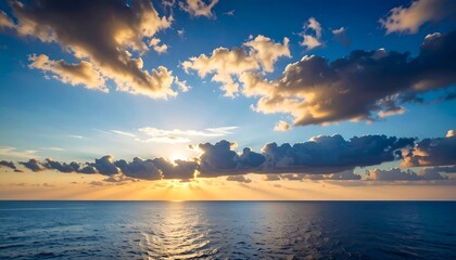 Vast sunset over tranquil ocean