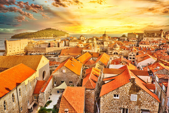 sunset on Dubrovnik walls of Croatia. Crkva sv. Vlaho church and Dubrovnik Cathedral of the Assumption of the Virgin Mary. Dubrovnik UNESCO Venetian town of Croatia in Dalmatia.