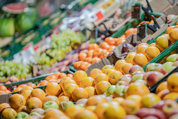 Assorted Fresh Fruits in Market Crates at Night