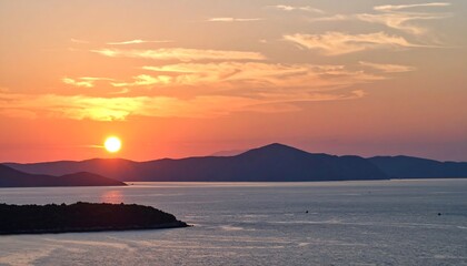 Sunset over a tranquil coastline