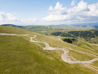 Aerial view of the spectacular Transalpina road with many serpentines crossing the Carpathian mountains at high altitude