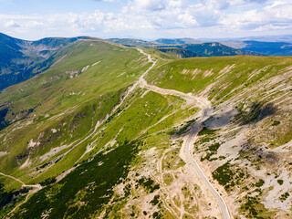 Aerial view of the spectacular Transalpina road with many serpentines crossing the Carpathian mountains at high altitude