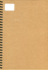 Black spiral brown beige cardboard cover school notebook or office notebookand white label