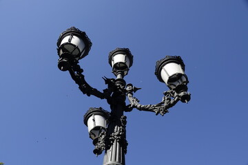 street lamp on blue sky