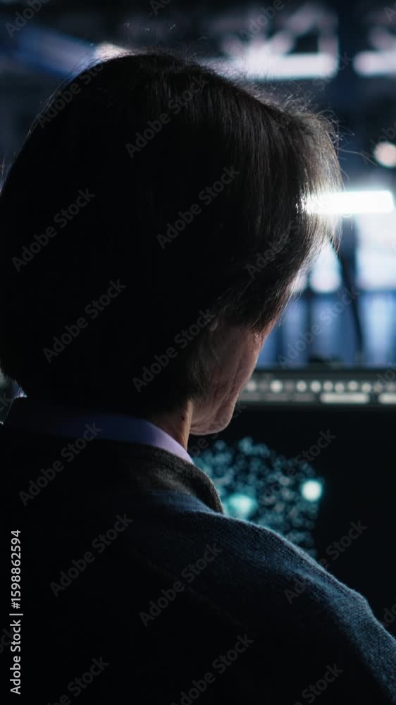 Poster vertical video data center engineer using computer to monitor neural network ai llm visualization. i