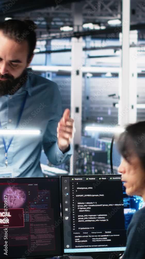 Poster vertical video data center manager coordinating programmers fixing critical error while using ai. se