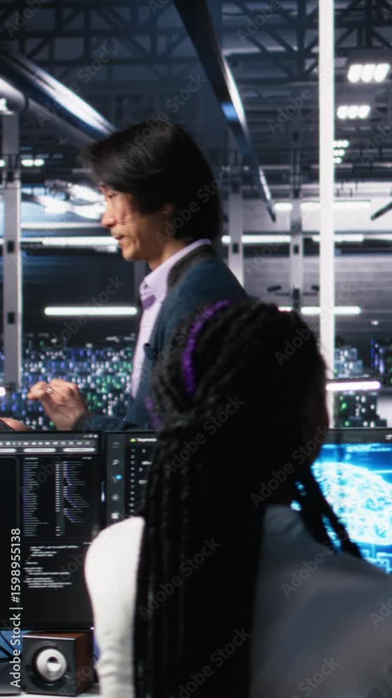 Poster vertical video data center manager supervising developer using device to monitor neural network ai l