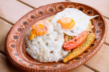 Fried eggs with rice and jalapeno