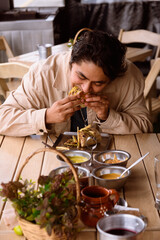 Man eating a burrito