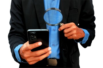 close up photo of businessman's hand holding cellphone and magnifying glass
