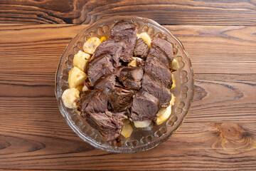 top view bowl of fruit salad with sliced beef at horizontal composition