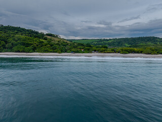 Stunning  aerial view of Playa Cabuyal, Costa Rica — a hidden gem with pristine sand, turquoise waters, and untouched nature, perfect for eco-tourism and beach lovers.