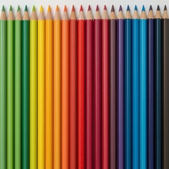  colored pencils arranged in rainbow gradient spectrum - complete art supplies and creative tools set