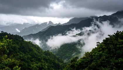 Misty mountain range shrouded in clouds