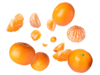 Juicy tangerines swirling in air against white background