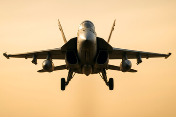 Fototapeta premium Military Fighter Jet Flies Directly Overhead With Landing Gear Down During Sunset Sky Moment