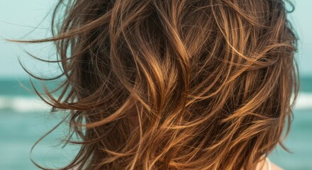 Naklejka premium Windblown Brown Hair at the Beach