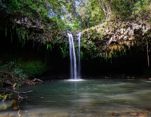 Waterfall on the Road to Hana, Maui, Hawaii. A peaceful waterfall in forest. 