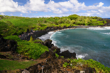 tropical beach with trees and blue sky, Maui, Hawaii. Black Sand Beach.