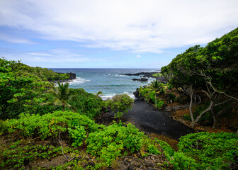Tropical Beach on Maui, Hawaii. Black Sand Beach at Wai'anapanapa State Park on the road to Hana.