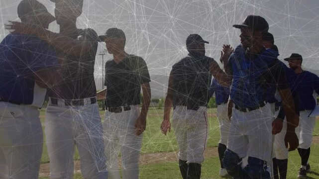 Baseball players lining up at home plate postgame exchanging high-fives showing sportsmanship