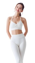 Fototapeta premium Woman in white athletic wear, confidently smiling, against a bright background. Demonstrating fitness and healthy lifestyle choices.