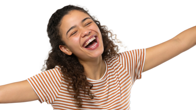 A young woman with curly hair is laughing joyfully with her arms outstretched on a transparent background