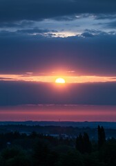 Fototapeta premium Vibrant Sunset Landscape with Purple and Orange Clouds
