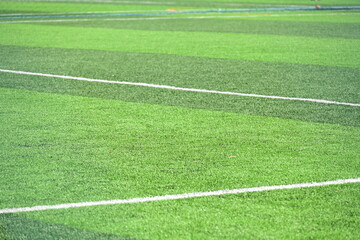 Obraz premium artificial green grass background for playground