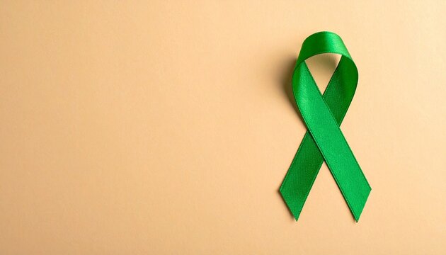 Isolated Green ribbon on Light Brown Background with Copyspace 