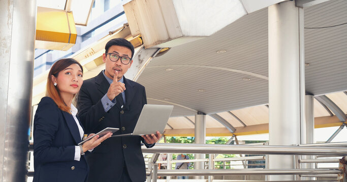 Business Partner using digital tablet online meeting team Partnership businessman, businesswoman talking together. Diversity Asian Business Partner online meeting trust teamwork. Asian Business team