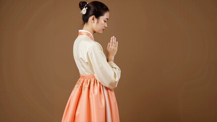Traditional Korean woman in hanbok praying, side profile, peaceful Asian culture portrait, elegant hanbok dress, Korean tradition, cultural heritage, meditation, graceful posture, beauty and spiritual