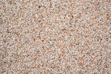 sandy texture of sand on beach by sea close up. Background with natural sandy pattern in coast