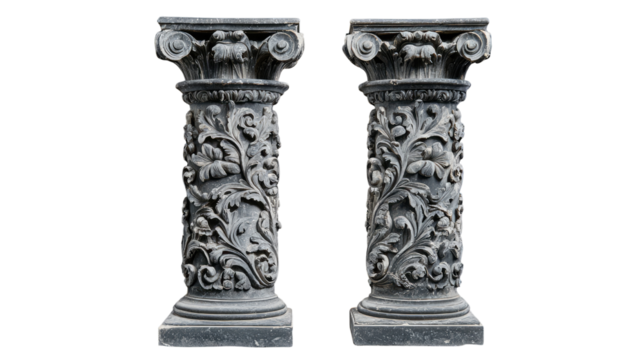a pair of identical intricately carved stone column on white background