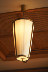 Elegant pendant light illuminating a warm interior space