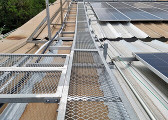 The perspective of Solar rooftop walkway installation.