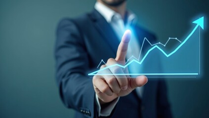 Businessman with hand on digital tablet screen showing a virtual success graph