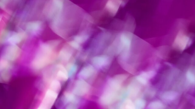 Blurred crystalized sparks. Iridescent light. Abstract prism with bokeh effect reflection with rainbow lens flare on multicolored background.