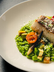 green-risotto-fish-close-up