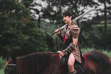 Brave Warrior on Horseback with Sword in a Natural Landscape