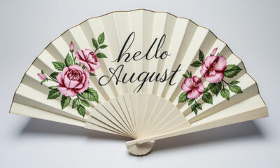 A Still Life of a Beautiful, Hand-Painted Fan with "Hello August" Written on It in Elegant Script