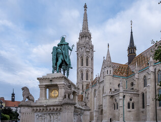 Fototapeta premium Budapest, Hungary – View of the equestrian statue of St. Stephen I at Fisherman’s Bastion, Buda Castle—depicting Hungary’s first king in regal pose atop a bronze horse
