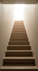 Obraz premium Ascending staircase leading towards bright light architecture concept