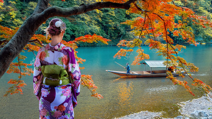 Japanese Woman in Traditional Kimono Dress with Hozu River Boat Cruises in Katsura river  in...