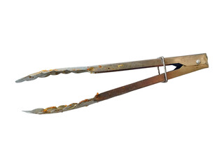 Old rusty metal kitchen tongs isolated on transparent background. Aged and corroded stainless steel...