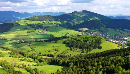 Lush green hills and valleys under a cloudy sky