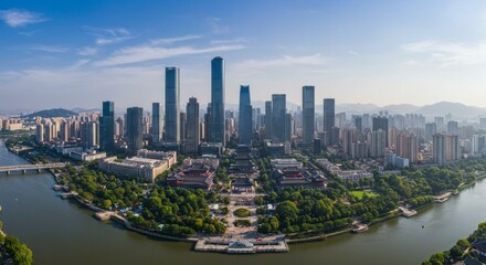 Naklejka premium Panoramic view of a modern city with a river and park