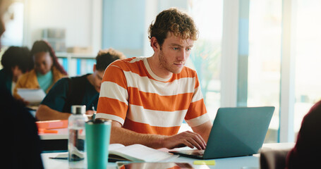 Laptop, college and typing with man in classroom for software bootcamp, web developer and research....