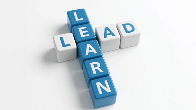 Leadership and education concept with crossword blocks spelling learn and lead symbolizing personal development skill and motivation