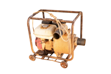 Old water pump motor isolated on cut out PNG or transparent background.  Industrial water technology. For farmers to suck water from pond for agricultural purposes on concrete floor